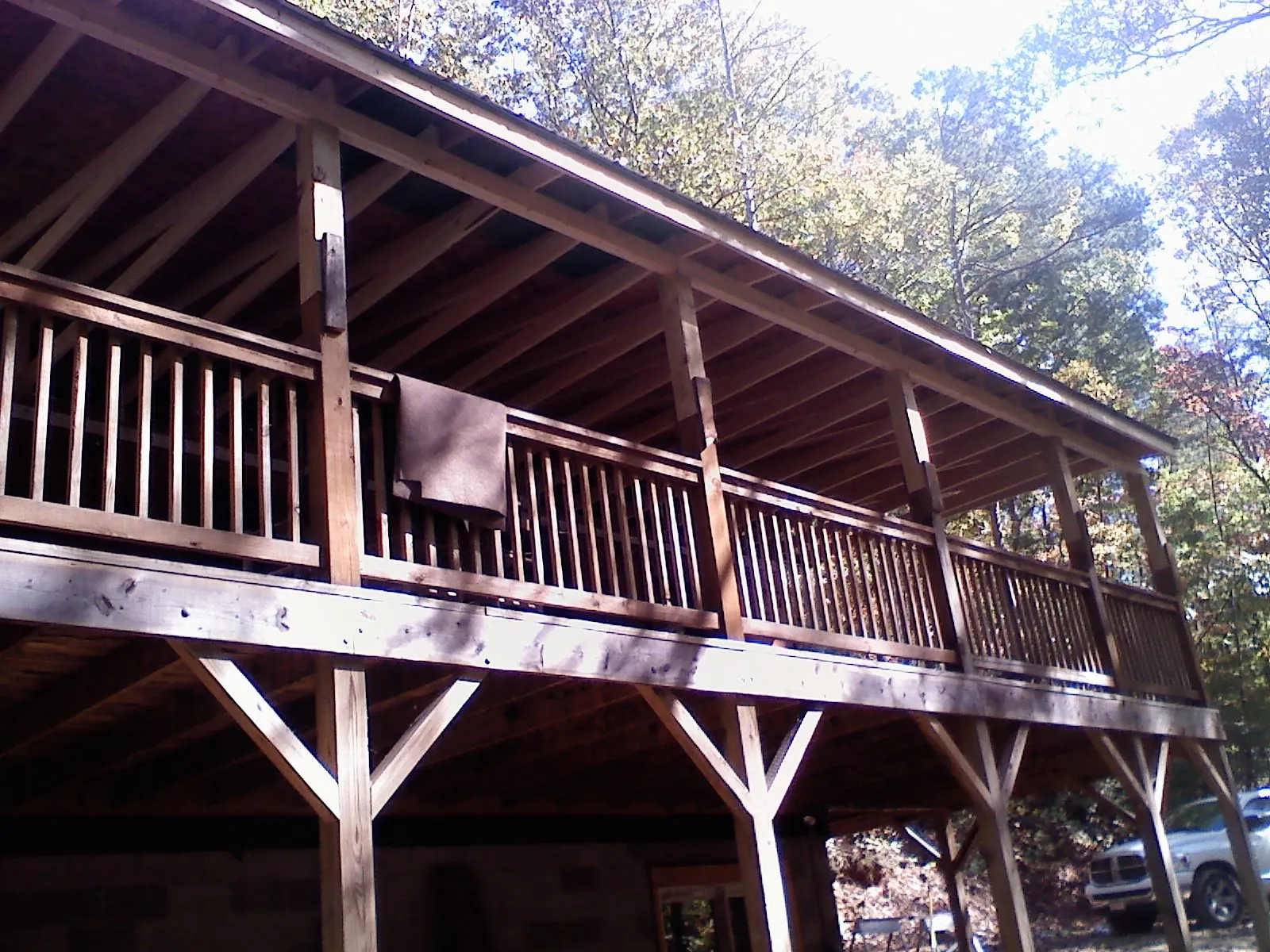 Timber framing under a new elevated porch and deck — Roof Leak Repair in Lakehead by Roofing Brothers